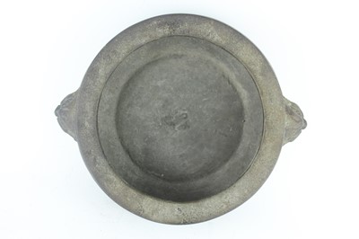 Lot 74 - A Chinese bronze censer with two mask handles,...