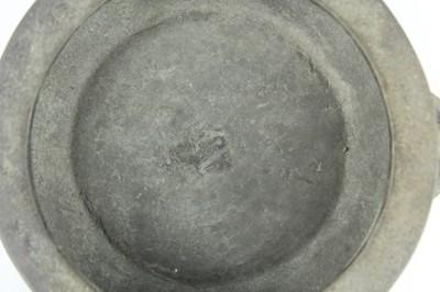 Lot 74 - A Chinese bronze censer with two mask handles,...