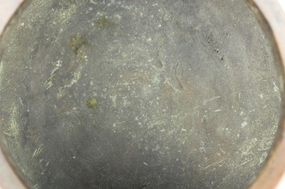 Lot 73 - A Chinese bronze censer with two loop handles,...