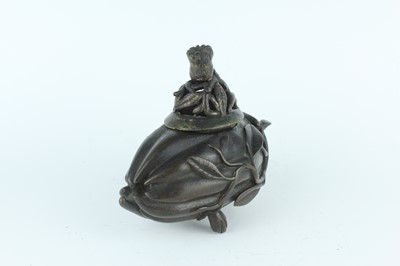 Lot 70 - A Chinese ‘finger-citron’ bronze incense...