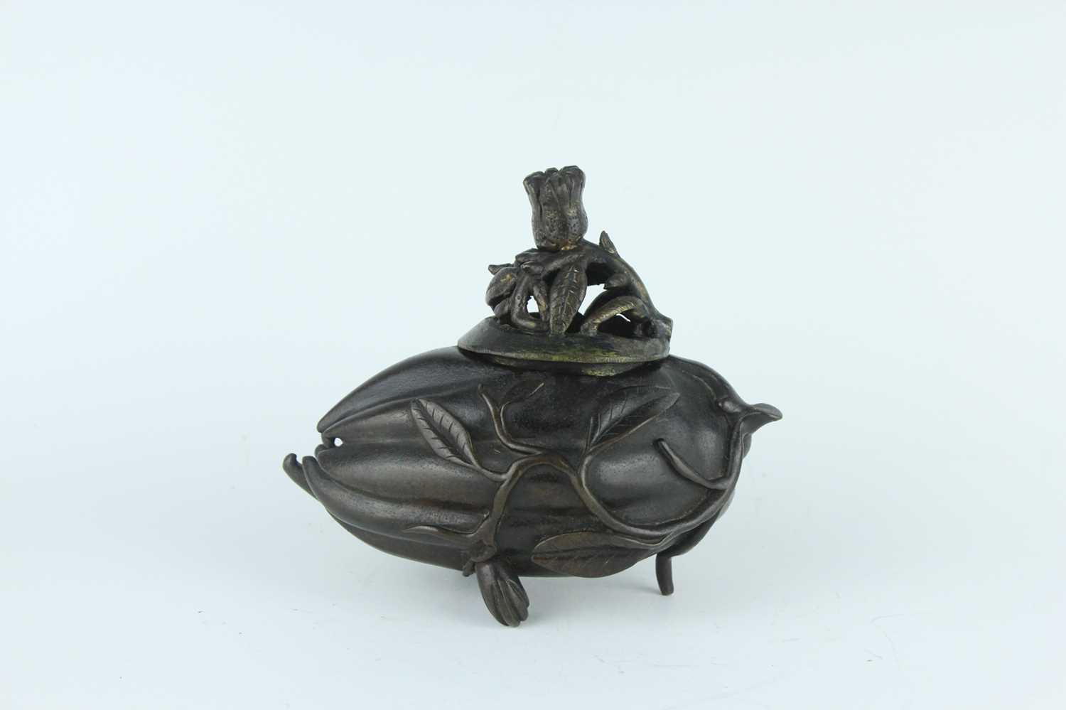 Lot 70 - A Chinese ‘finger-citron’ bronze incense...