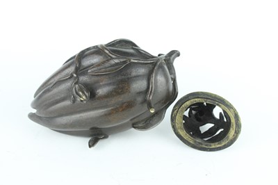 Lot 70 - A Chinese ‘finger-citron’ bronze incense...