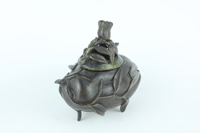 Lot 70 - A Chinese ‘finger-citron’ bronze incense...