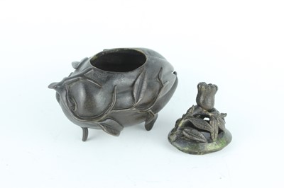 Lot 70 - A Chinese ‘finger-citron’ bronze incense...
