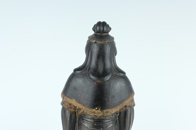 Lot 44 - A Chinese lacquered wooden figure of a deity,...