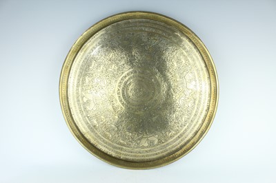 Lot 261 - A Persian brass serving tray, early 20th...