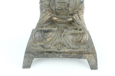 Lot 65 - A Chinese bronze figure of a seated...