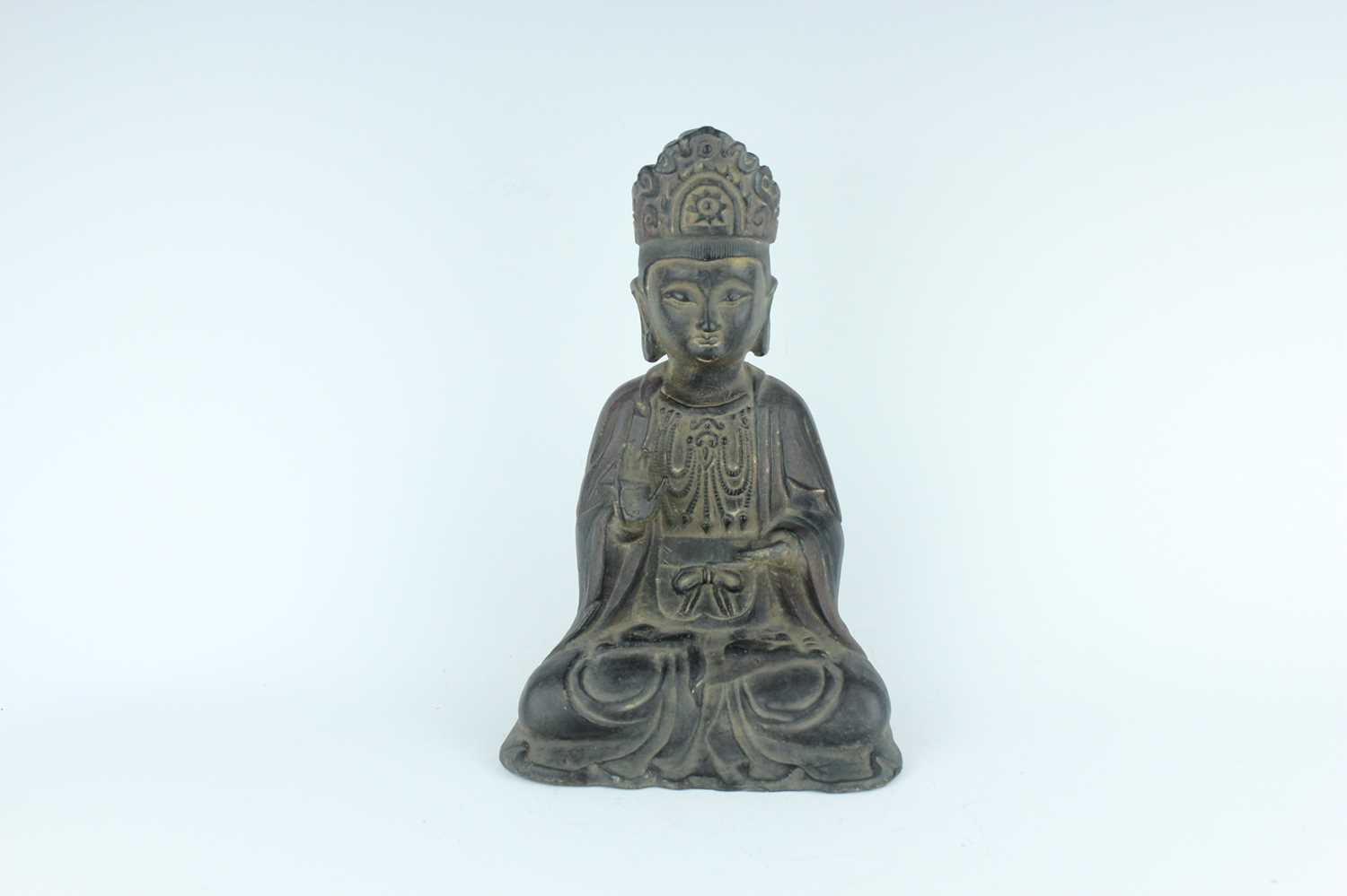 Lot 66 - A Chinese bronze figure of a seated Buddha,...