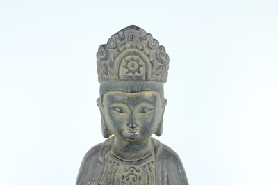 Lot 66 - A Chinese bronze figure of a seated Buddha,...