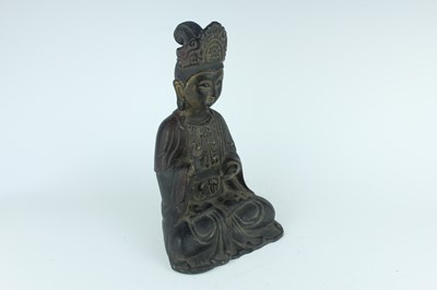 Lot 66 - A Chinese bronze figure of a seated Buddha,...