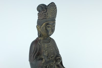 Lot 66 - A Chinese bronze figure of a seated Buddha,...