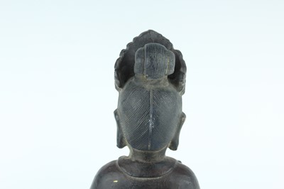 Lot 66 - A Chinese bronze figure of a seated Buddha,...