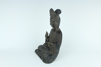 Lot 66 - A Chinese bronze figure of a seated Buddha,...