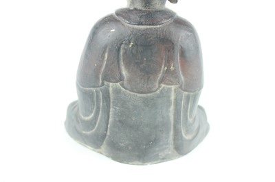 Lot 66 - A Chinese bronze figure of a seated Buddha,...