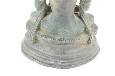 Lot 67 - A Chinese bronze figure of Buddha seated on a...