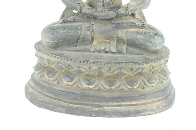 Lot 67 - A Chinese bronze figure of Buddha seated on a...