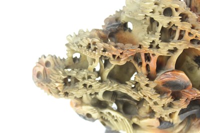 Lot 36 - A Chinese Shoushan stone landscape carving,...