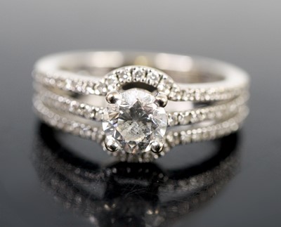 Lot 2609 - An 18ct white gold diamond solitaire ring,...