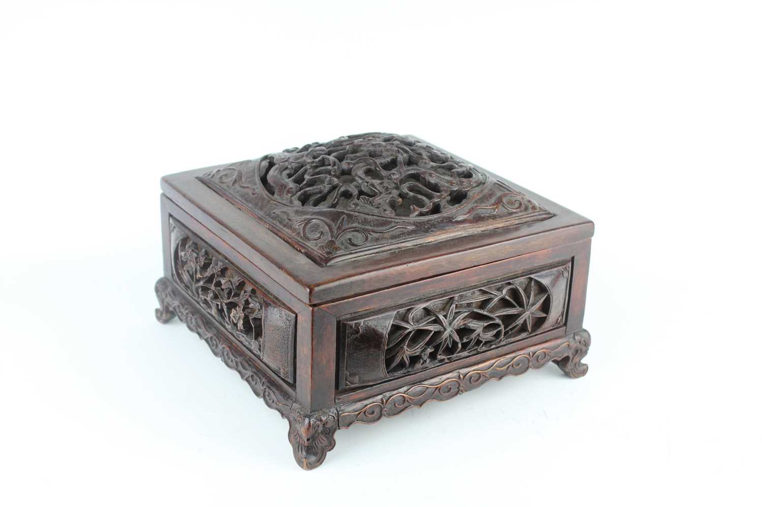Lot 41 - A Chinese hardwood square box with domed cover...