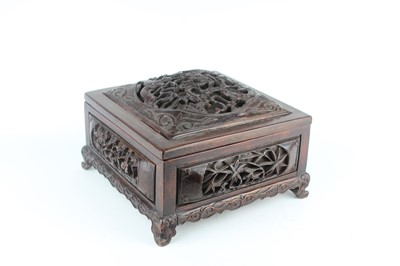Lot 41 - A Chinese hardwood square box with domed cover...