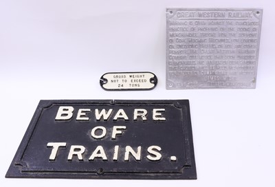 Lot 75 - Three signs: ‘Beware of Trains’ in cast iron,...