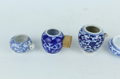 Lot 26 - A group of nine Chinese porcelain bird feeders,...