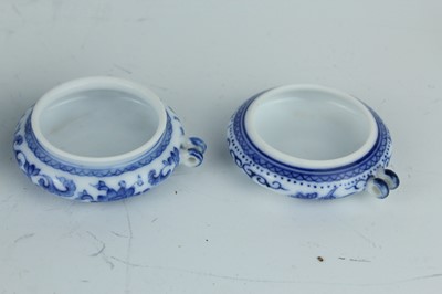 Lot 26 - A group of nine Chinese porcelain bird feeders,...