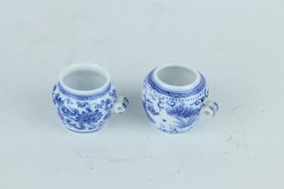 Lot 26 - A group of nine Chinese porcelain bird feeders,...