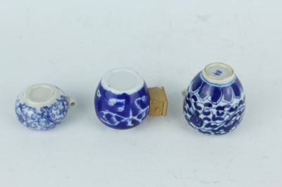 Lot 26 - A group of nine Chinese porcelain bird feeders,...
