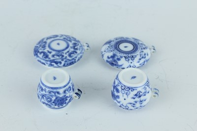 Lot 26 - A group of nine Chinese porcelain bird feeders,...