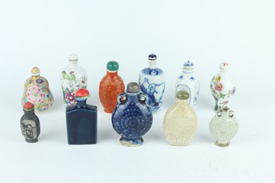 Lot 27 - A group of eleven Chinese porcelain snuff...