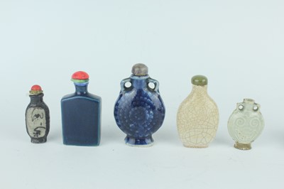 Lot 27 - A group of eleven Chinese porcelain snuff...
