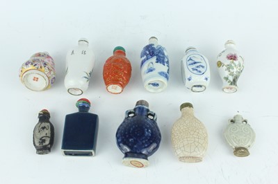 Lot 27 - A group of eleven Chinese porcelain snuff...