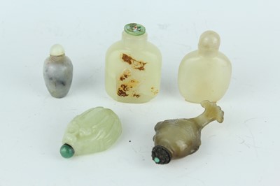 Lot 35 - A group of five Chinese jade and hardstone...