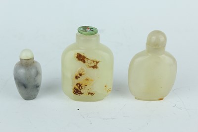Lot 35 - A group of five Chinese jade and hardstone...