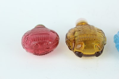 Lot 29 - A group of seven Chinese glass snuff bottles,...