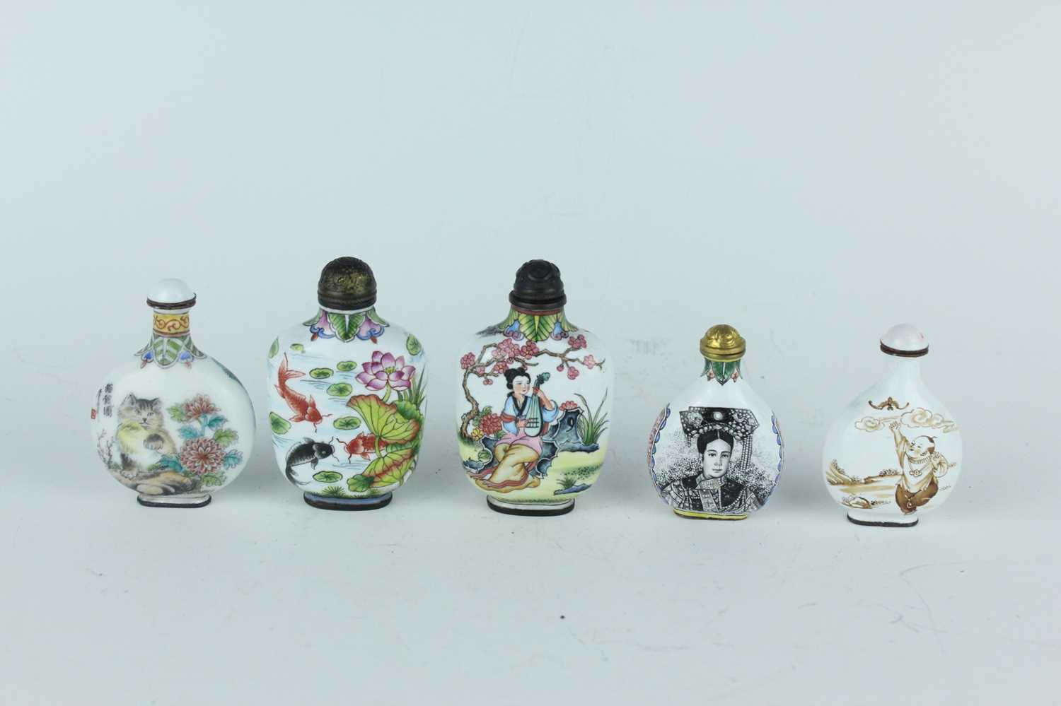 Lot 28 - A group of five Chinese painted enamel snuff...