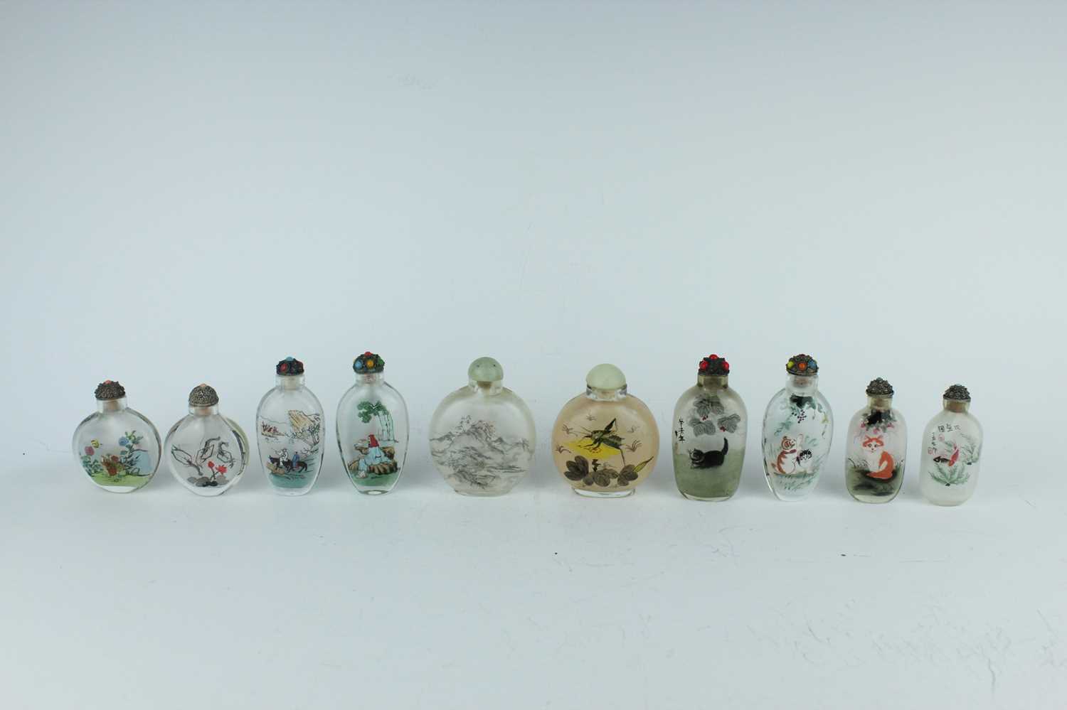 Lot 32 - A group of ten Chinese inside-painted glass...