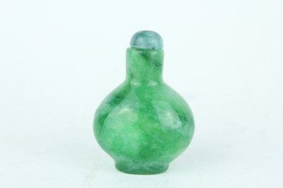 Lot 34 - A Chinese jadeite snuff bottle, 20th century...