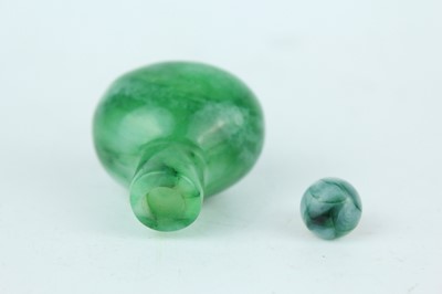 Lot 34 - A Chinese jadeite snuff bottle, 20th century...