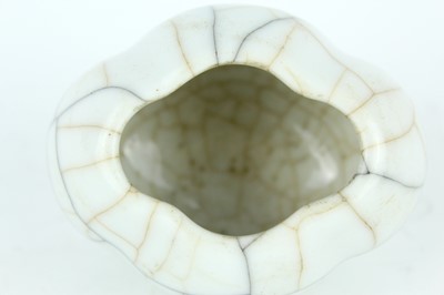 Lot 94 - A Chinese Ge-type water pot with a small ladle,...