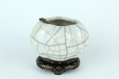 Lot 94 - A Chinese Ge-type water pot with a small ladle,...