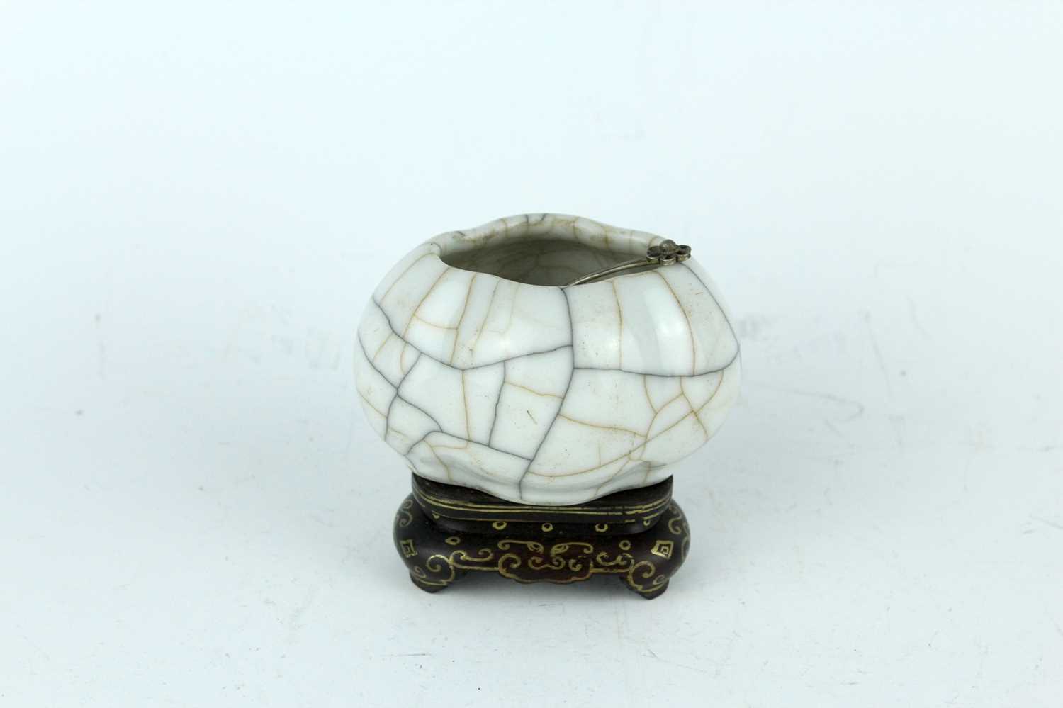 Lot 94 - A Chinese Ge-type water pot with a small ladle,...