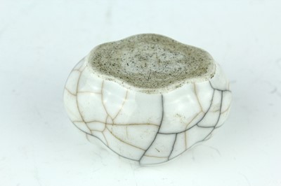 Lot 94 - A Chinese Ge-type water pot with a small ladle,...