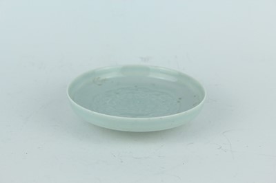 Lot 97 - A Chinese celadon-glazed washer, Qing Dynasty,...