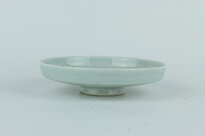 Lot 97 - A Chinese celadon-glazed washer, Qing Dynasty,...