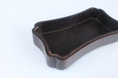 Lot 40 - A Chinese hardwood inlaid box with three jade...