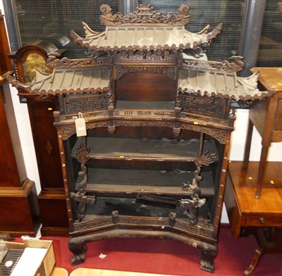 Lot 264 - A Chinese carved and pierced 'rosewood' pagoda...