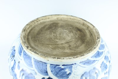 Lot 173 - A large Chinese blue and white fish bowl, 20th...
