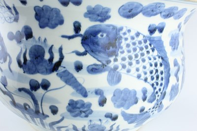 Lot 173 - A large Chinese blue and white fish bowl, 20th...